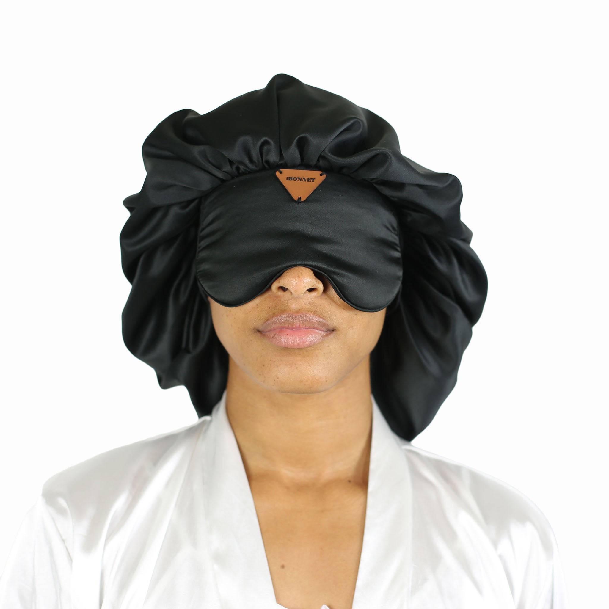 Image of a lady wearing head cover with eye mask