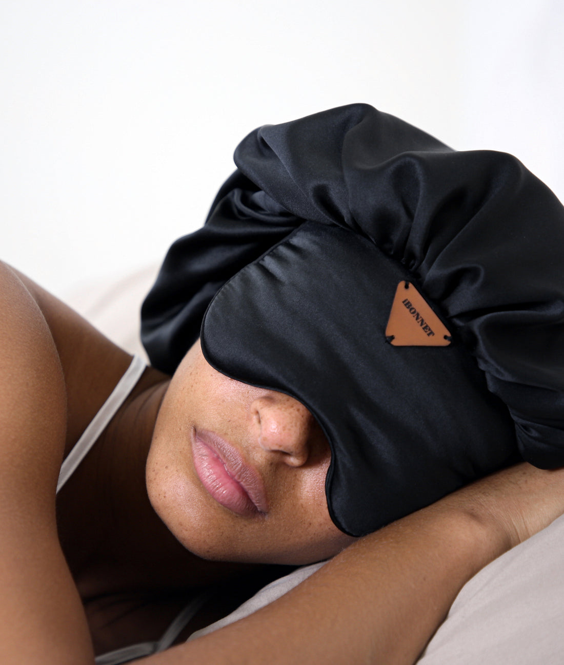 Image of a sleeping women wearing iBonnet